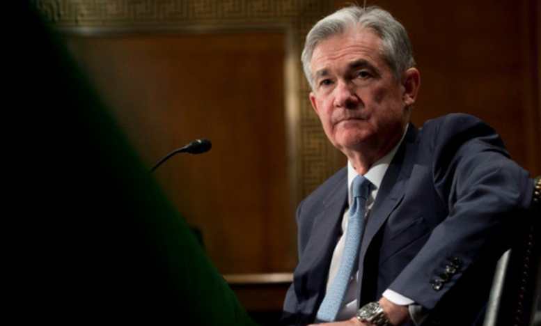 Fed Hikes Interest Rate, Its First Under New Chief Powell