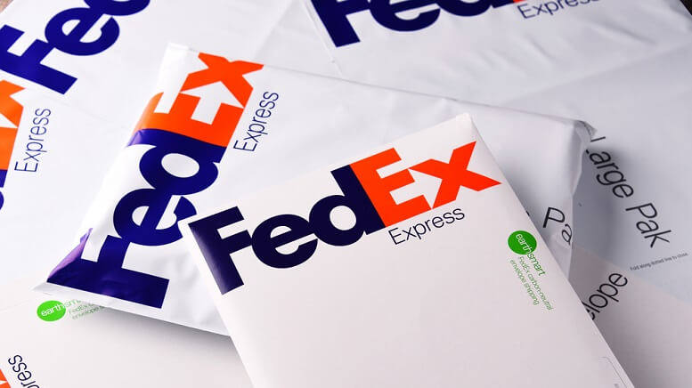 FedEx stock down 8% after company lowers outlook on trade tensions